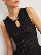 Semi-Sheer Knit Peplum Top With Bow Detail