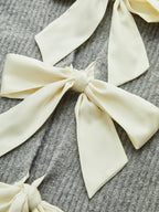 Wool Blend Short Sleeve Bow Knit Top