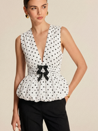 Polka Dot Bow Sleeveless Peplum Top
