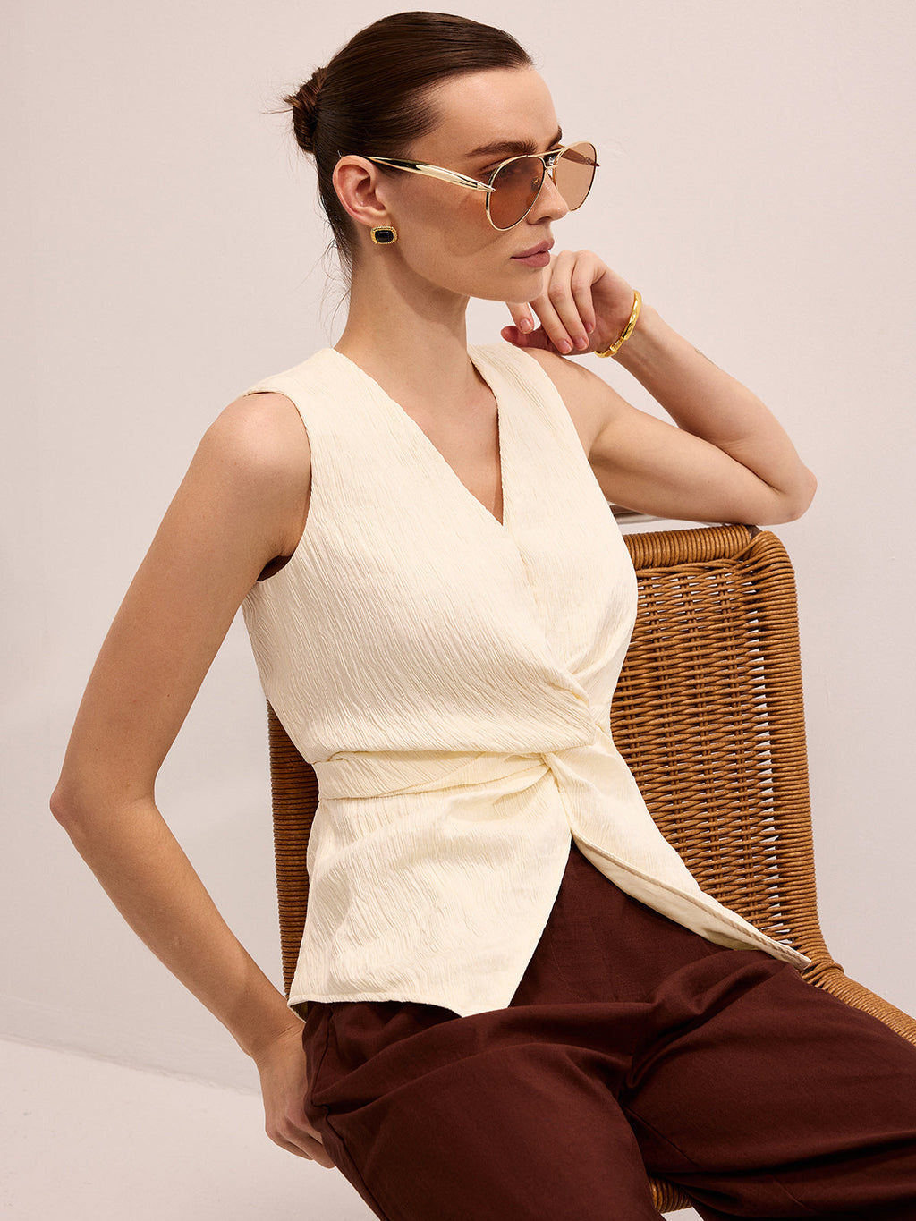 Twisted Sleeveless V-Neck Blouse
