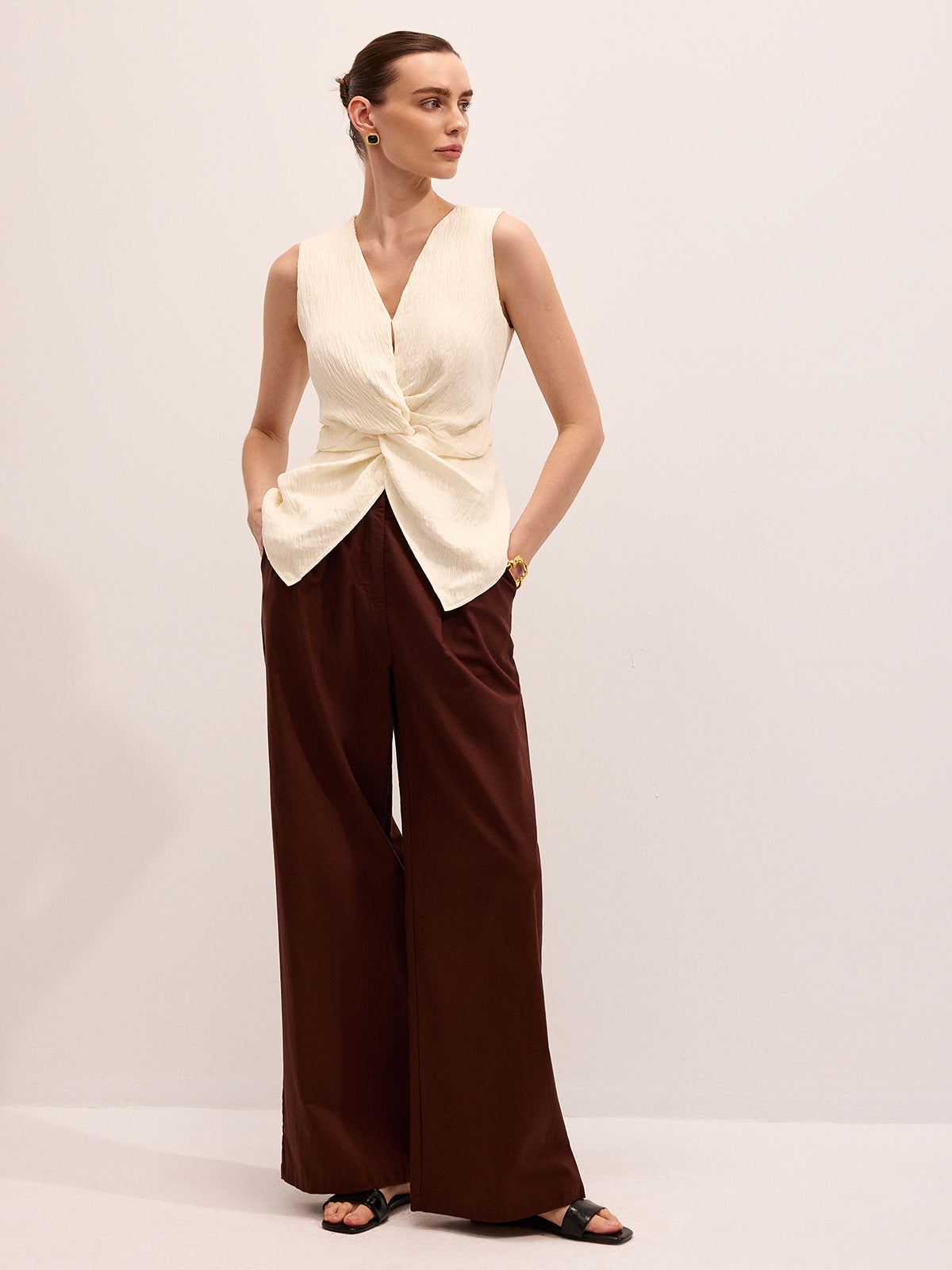 Twisted Sleeveless V-Neck Blouse