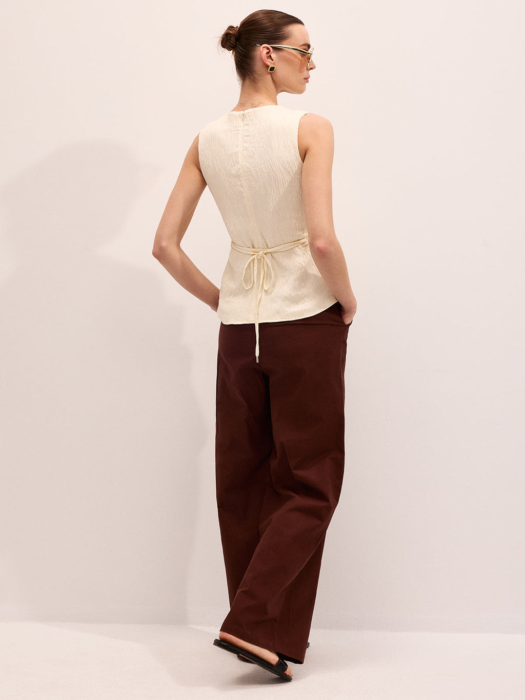 Twisted Sleeveless V-Neck Blouse